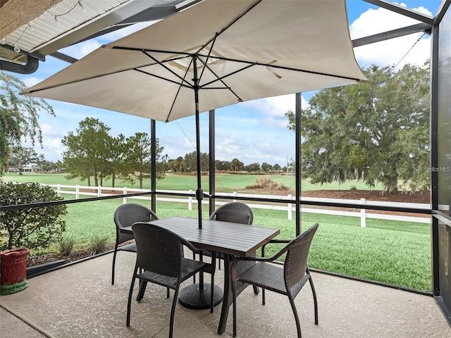 8447 SW 82nd Loop, Ocala, FL 34481 - sunroom featuring golf course view and outdoor dining space