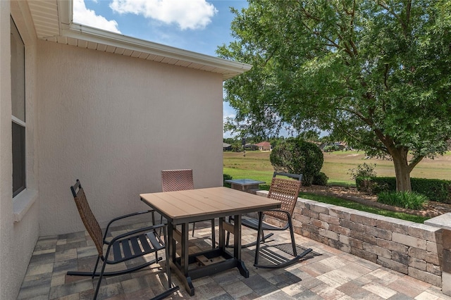 1748 SW 157th Place Rd, Ocala, FL 34473 - view of patio / terrace featuring outdoor dining space