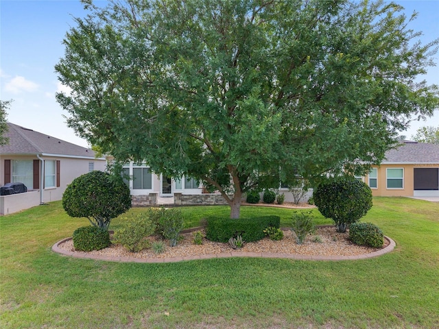 1748 SW 157th Place Rd, Ocala, FL 34473 - view of front of property featuring a front lawn and stone siding