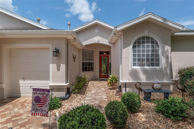 1748 SW 157th Place Rd, Ocala, FL 34473 - view of exterior entry with stucco siding