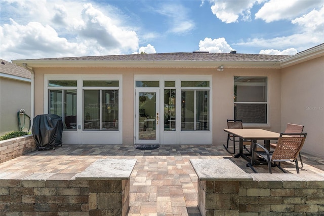 1748 SW 157th Place Rd, Ocala, FL 34473 - back of house with a patio and stucco siding