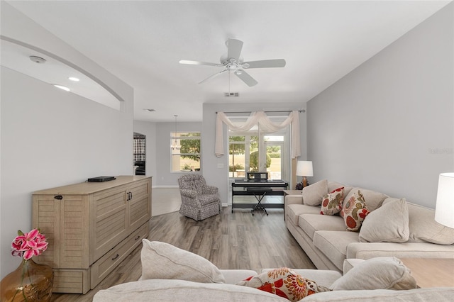 1748 SW 157th Place Rd, Ocala, FL 34473 - living area with light wood finished floors and a ceiling fan