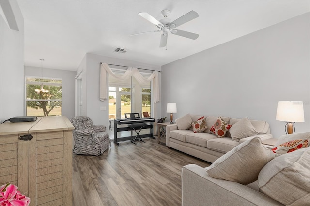 1748 SW 157th Place Rd, Ocala, FL 34473 - living area with wood finished floors and ceiling fan