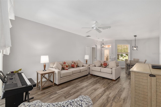 1748 SW 157th Place Rd, Ocala, FL 34473 - living room with wood finished floors and ceiling fan