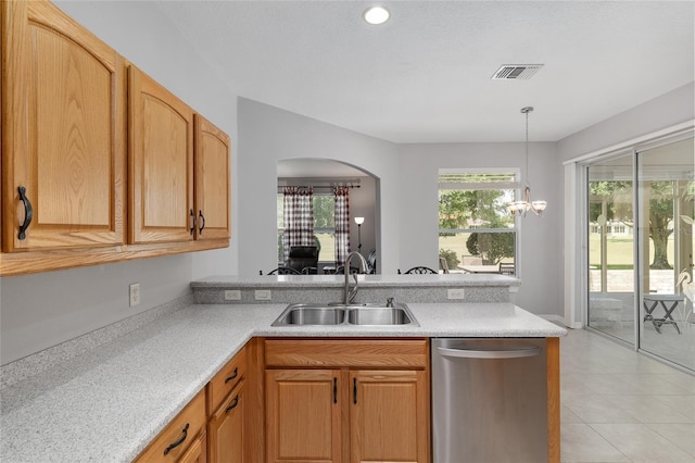 1748 SW 157th Place Rd, Ocala, FL 34473 - kitchen featuring dishwasher, a sink, a peninsula, and light countertops