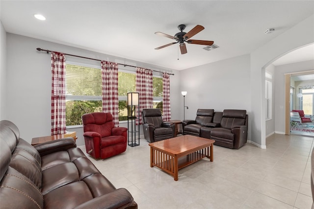 1748 SW 157th Place Rd, Ocala, FL 34473 - living area with arched walkways, ceiling fan, light tile patterned floors, recessed lighting, and baseboards