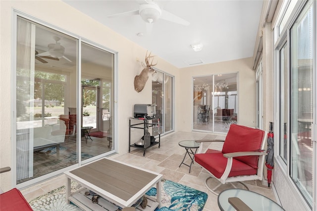 1748 SW 157th Place Rd, Ocala, FL 34473 - sunroom with a ceiling fan