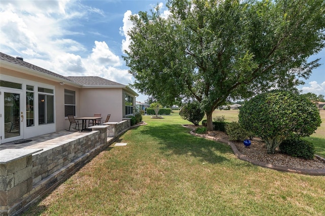 1748 SW 157th Place Rd, Ocala, FL 34473 - view of green lawn featuring a patio