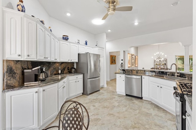3141 Roswell Rd, The Villages, FL 32162 - kitchen featuring appliances with stainless steel finishes, a sink, ceiling fan, tasteful backsplash, and white cabinets
