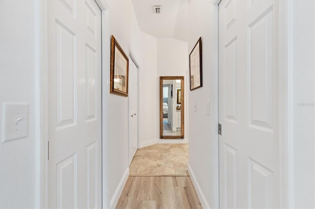 3141 Roswell Rd, The Villages, FL 32162 - hallway with light wood finished floors and baseboards