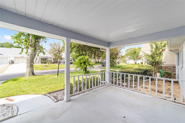 8885 SW 90th Ave, Ocala, FL 34481 - porch with a residential view and a lawn
