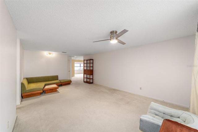 8885 SW 90th Ave, Ocala, FL 34481 - unfurnished room with a ceiling fan, carpet, and a textured ceiling