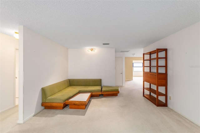 8885 SW 90th Ave, Ocala, FL 34481 - living area featuring carpet floors and a textured ceiling