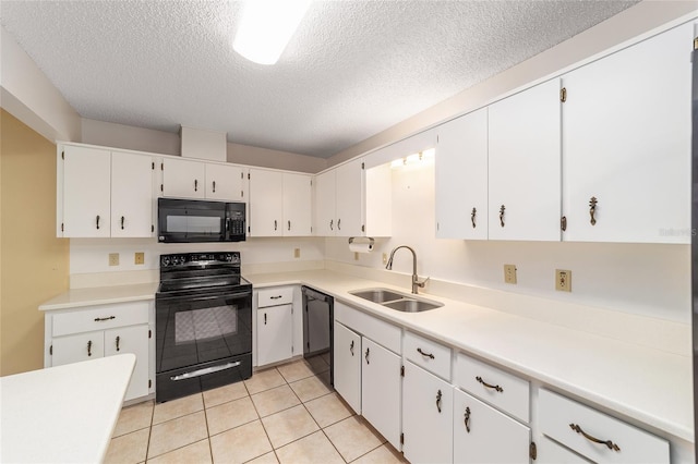 8885 SW 90th Ave, Ocala, FL 34481 - kitchen with black appliances, a sink, a textured ceiling, white cabinetry, and light countertops