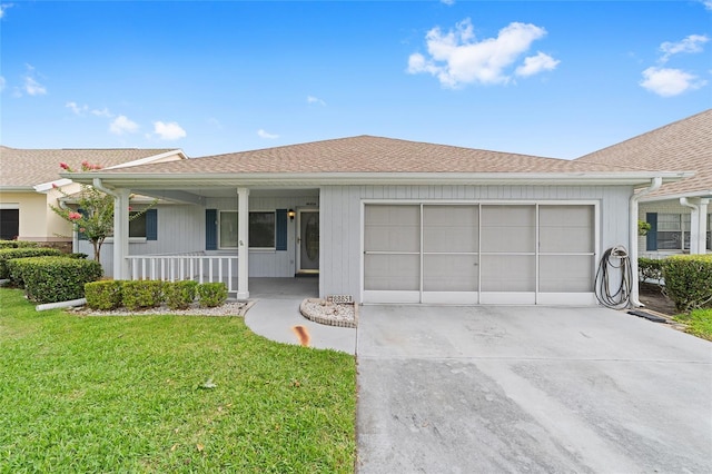8885 SW 90th Ave, Ocala, FL 34481 - single story home with an attached garage, driveway, a porch, a front lawn, and roof with shingles