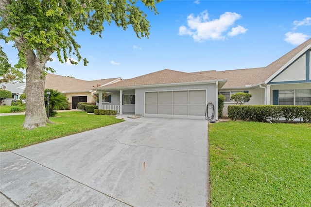 8885 SW 90th Ave, Ocala, FL 34481 - ranch-style home featuring an attached garage, a front lawn, and concrete driveway