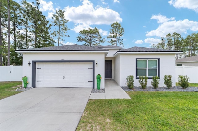 7479 SW 130th Ln, Ocala, FL 34473 - ranch-style home with an attached garage, concrete driveway, and stucco siding