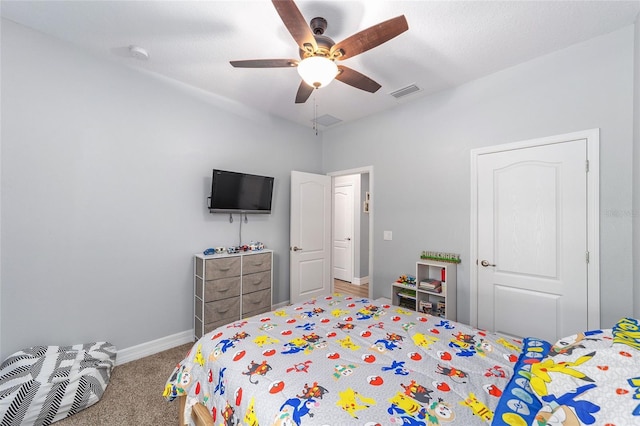 7479 SW 130th Ln, Ocala, FL 34473 - carpeted bedroom with baseboards and ceiling fan
