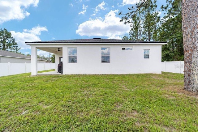 7479 SW 130th Ln, Ocala, FL 34473 - rear view of property with stucco siding, ceiling fan, and a patio
