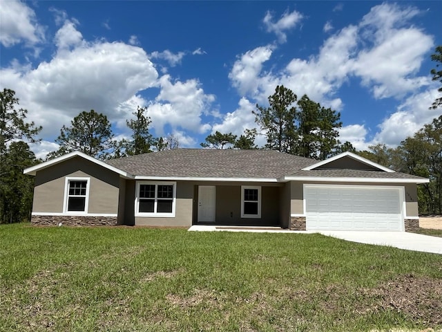 12505 SW 73rd St, Ocala, FL 34481 - single story home with stone siding, an attached garage, and stucco siding