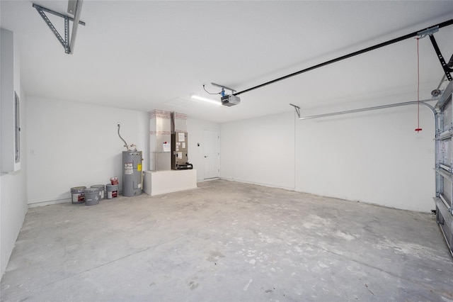12505 SW 73rd St, Ocala, FL 34481 - garage with electric water heater and a garage door opener