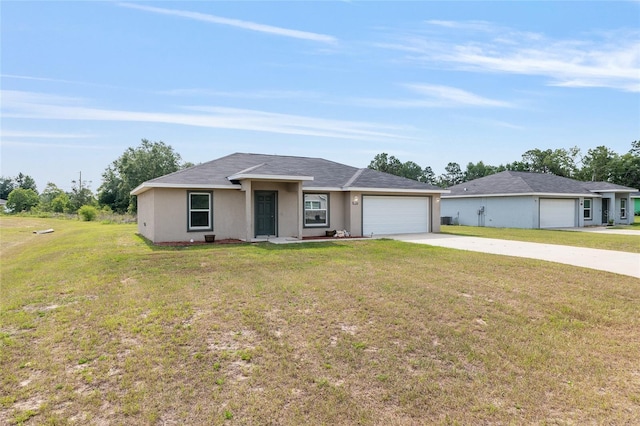 6561 SW 129th Loop, Ocala, FL 34473 - ranch-style house featuring concrete driveway, a garage, a front lawn, and stucco siding