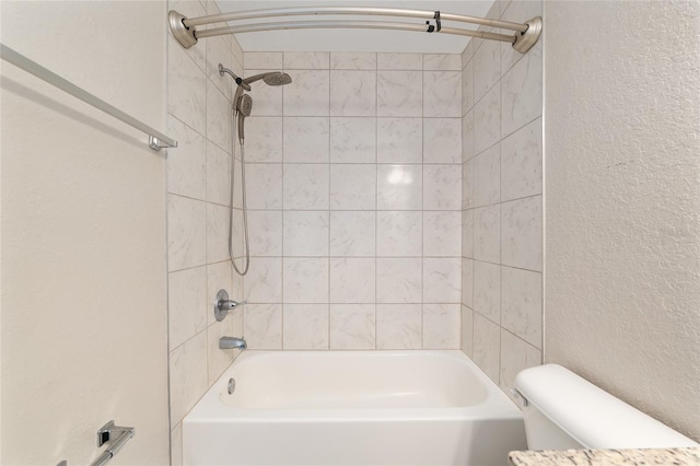 6561 SW 129th Loop, Ocala, FL 34473 - full bath featuring toilet,  shower combination, and a textured wall