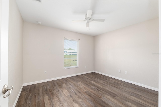 6561 SW 129th Loop, Ocala, FL 34473 - unfurnished room with wood finished floors, baseboards, and ceiling fan