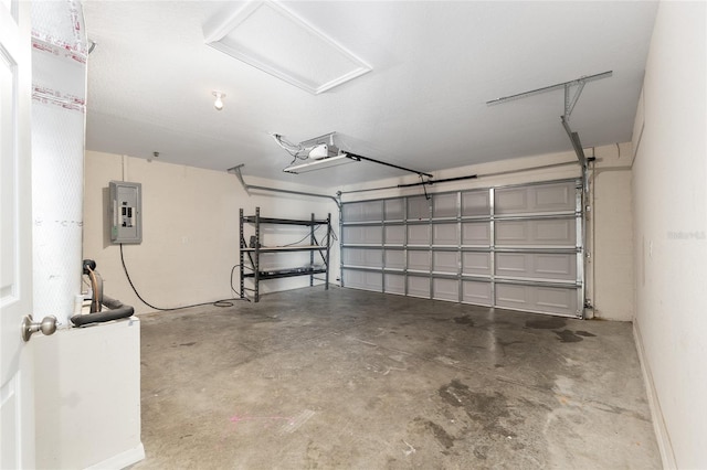 6561 SW 129th Loop, Ocala, FL 34473 - garage featuring electric panel and a garage door opener
