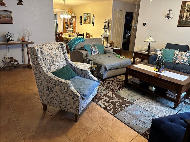 27 Cedar Tree Ter, Ocala, FL 34472 - tiled living area featuring a chandelier