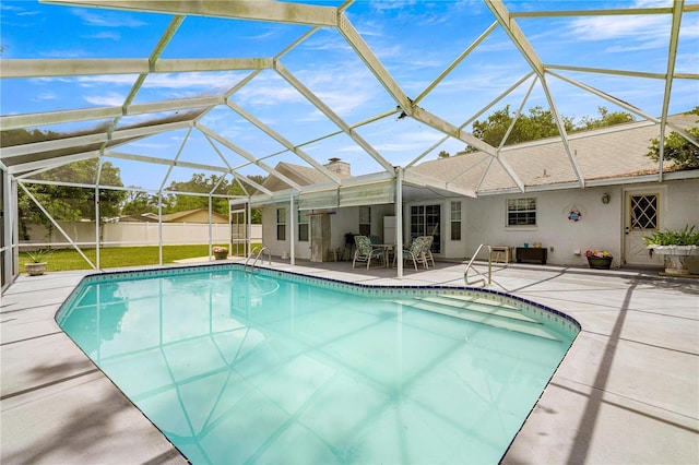 6070 SE 39th Ave, Ocala, FL 34480 - view of swimming pool with a patio and glass enclosure