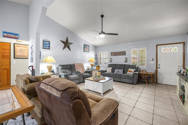 6070 SE 39th Ave, Ocala, FL 34480 - living room featuring vaulted ceiling, a ceiling fan, and light tile patterned floors