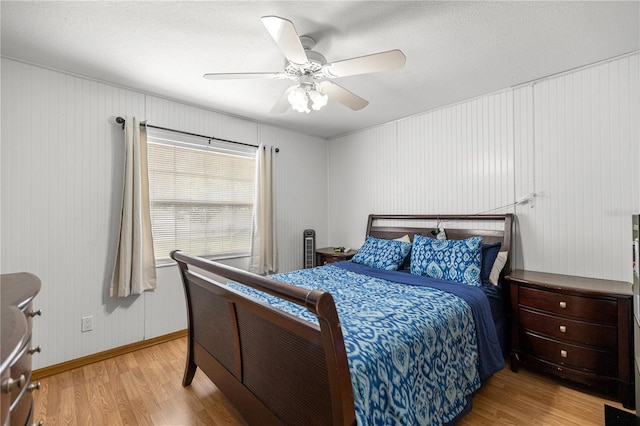 6070 SE 39th Ave, Ocala, FL 34480 - bedroom featuring light wood-style flooring, baseboards, and ceiling fan