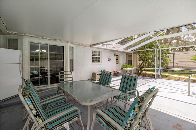 6070 SE 39th Ave, Ocala, FL 34480 - sunroom / solarium featuring outdoor dining area