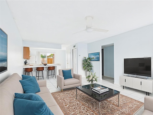 1801 Caralee Blvd Unit 2, Orlando, FL 32822 - living room featuring light tile patterned floors and a ceiling fan