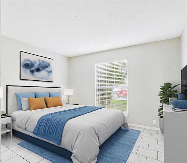 1801 Caralee Blvd Unit 2, Orlando, FL 32822 - bedroom featuring baseboards and light tile patterned floors