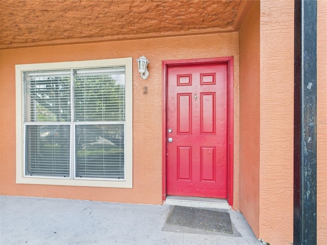 1801 Caralee Blvd Unit 2, Orlando, FL 32822 - doorway to property with stucco siding