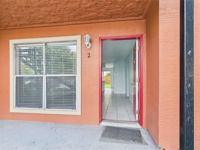 1801 Caralee Blvd Unit 2, Orlando, FL 32822 - view of exterior entry with stucco siding