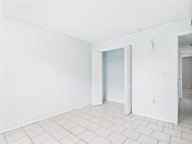 1801 Caralee Blvd Unit 2, Orlando, FL 32822 - unfurnished bedroom featuring a closet and baseboards