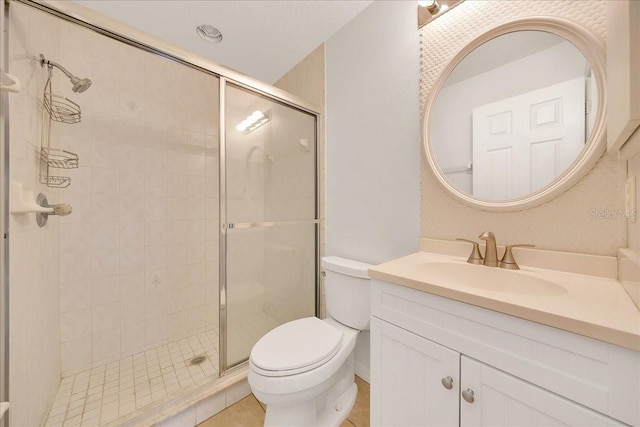 6350 NW 135th Ave, Morriston, FL 32668 - bathroom with toilet, a shower stall, vanity, and tile patterned floors