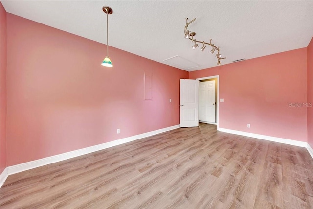 6350 NW 135th Ave, Morriston, FL 32668 - spare room featuring light wood-style floors and baseboards