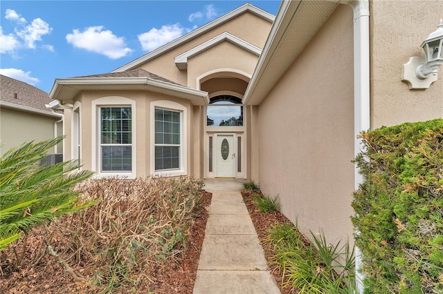 11062 SW 73rd Ct, Ocala, FL 34476 - view of exterior entry with stucco siding