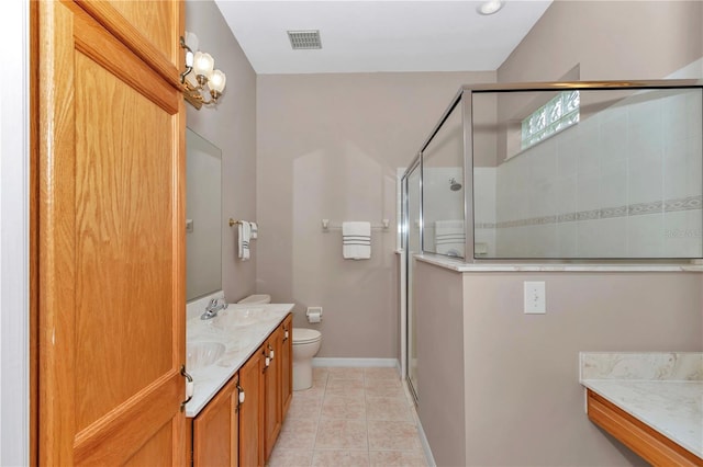 11062 SW 73rd Ct, Ocala, FL 34476 - full bathroom featuring toilet, double vanity, a stall shower, tile patterned floors, and baseboards