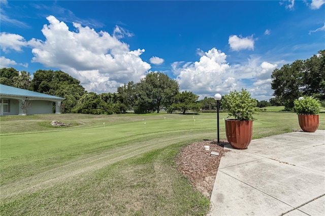 11062 SW 73rd Ct, Ocala, FL 34476 - view of grassy yard with a putting area and golf course view