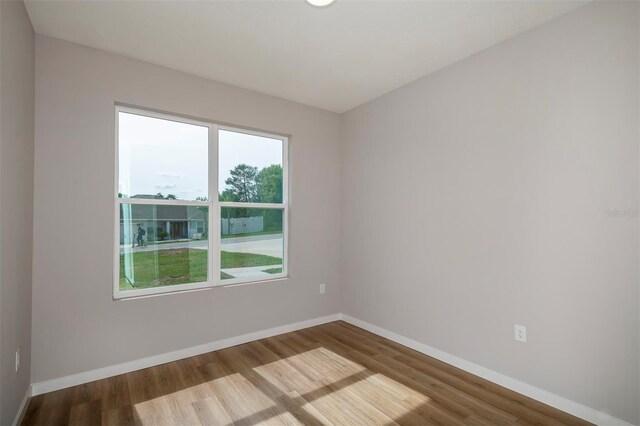 10207 SW 41st Ter W, Ocala, FL 34476 - spare room with wood finished floors