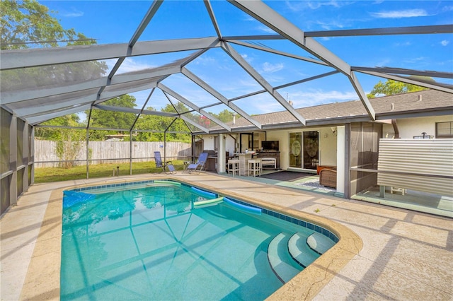5720 SE 20th St, Ocala, FL 34480 - view of pool featuring a patio area, a fenced backyard, and glass enclosure