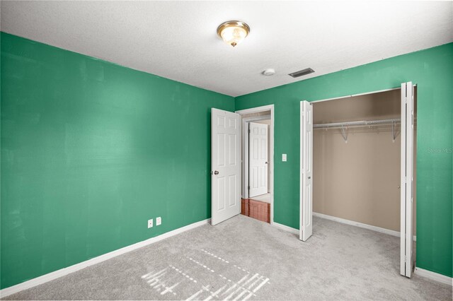 5720 SE 20th St, Ocala, FL 34480 - unfurnished bedroom featuring carpet floors, baseboards, and a closet