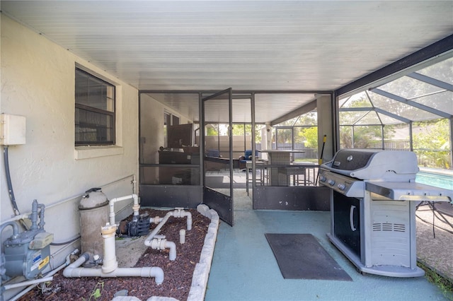 5720 SE 20th St, Ocala, FL 34480 - view of patio with grilling area and glass enclosure