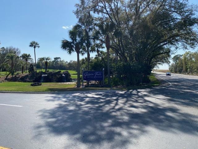 7637 SW 180th Cir, Dunnellon, FL 34432 - view of asphalt road with curbs