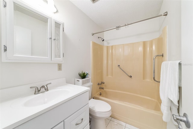 2701 NE 10th St Unit 101, Ocala, FL 34470 - full bath with bathtub / shower combination, toilet, vanity, a textured ceiling, and tile patterned floors